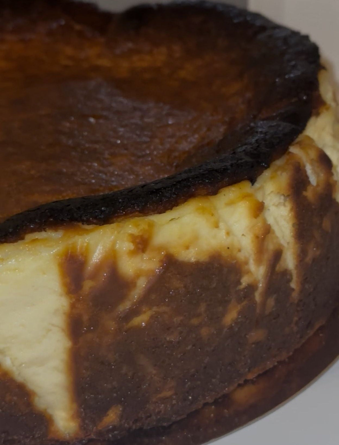 Full cake Whole Basque cheesecake with burnt top - San Sebastian style